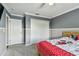 Cozy bedroom with carpet, closet, a comfortable bed, and neutral decor at 31111 Bridgegate Dr, Wesley Chapel, FL 33545