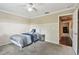 Bedroom featuring carpet, a large window, and neutral paint at 31111 Bridgegate Dr, Wesley Chapel, FL 33545