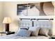 Main bedroom with modern decor and plush bedding at 10024 Merry Fawn Ct, Sun City Center, FL 33573
