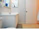 Bathroom featuring a toilet, vanity with mirror, and tile flooring at 10265 Gandy N Blvd # 1409, St Petersburg, FL 33702
