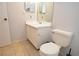 Bathroom with tiled floors, a single sink vanity, and a toilet at 10265 Gandy N Blvd # 1409, St Petersburg, FL 33702