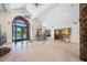 Spacious clubhouse with tiled floor, high ceilings, and large arched doors to the pool at 10265 Gandy N Blvd # 1409, St Petersburg, FL 33702