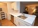 Well-lit kitchen with stainless steel appliances and white cabinets at 10265 Gandy N Blvd # 1409, St Petersburg, FL 33702