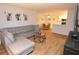 Cozy living room featuring a gray sectional sofa and open floor plan at 10265 Gandy N Blvd # 1409, St Petersburg, FL 33702