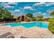 Large community pool with ample seating, perfect for social gatherings and leisure at 10265 Gandy N Blvd # 1409, St Petersburg, FL 33702