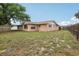 The property has a large backyard with a sunroom attached at 10336 Alice M Ct, Port Richey, FL 34668