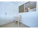 Enclosed patio boasting tile flooring, a chair, and natural light, perfect for relaxation at 11511 113Th St # 33D, Largo, FL 33778
