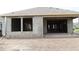 Block construction of new home showcasing back lanai and window placements at 11858 Richmond Trl, Parrish, FL 34219