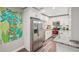 Bright kitchen with stainless steel appliances and modern white cabinets at 120 W Sligh Ave, Tampa, FL 33604