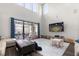 Open living area with sliding glass doors providing ample natural light at 12415 Hitching St, Odessa, FL 33556