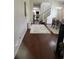 Elegant dining room featuring hardwood floors and staircase at 1247 Gentilly Ln, Wesley Chapel, FL 33544