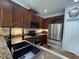 Modern kitchen with stainless steel appliances and granite countertops at 1247 Gentilly Ln, Wesley Chapel, FL 33544