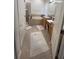 Bright main bathroom features dual sinks, a soaking tub, and a separate shower at 1247 Gentilly Ln, Wesley Chapel, FL 33544