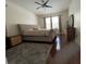 Spacious main bedroom with plush carpeting, a stylish ceiling fan, and ample natural light at 1247 Gentilly Ln, Wesley Chapel, FL 33544