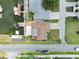 Aerial view of a canal-front home with boat dock access, ideal for waterfront living at 13727 Gene Rossi Ave, Hudson, FL 34667