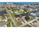 Aerial of a canal-front community offering waterfront living with easy ocean access at 13727 Gene Rossi Ave, Hudson, FL 34667