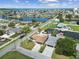 Waterfront community aerial view showcasing canal access and homes near the ocean at 13727 Gene Rossi Ave, Hudson, FL 34667