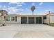 The backyard features a screened lanai, a concrete patio, and a storage shed at 13727 Gene Rossi Ave, Hudson, FL 34667