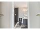Modern bathroom featuring stylish tiling, contemporary fixtures, and a glass-enclosed shower at 13727 Gene Rossi Ave, Hudson, FL 34667