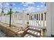 This property has a beautiful gate and brick steps leading up to the home at 13727 Gene Rossi Ave, Hudson, FL 34667