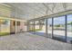 Enclosed lanai with brick pavers and access to the backyard and the canal at 13727 Gene Rossi Ave, Hudson, FL 34667