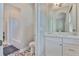 Bathroom showcasing a vanity with marble countertop, decorative tile flooring, and a bathtub with white subway tiles at 1410 E Curtis St # 2, Tampa, FL 33603
