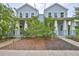Charming blue two-story home with a welcoming front porch and well-maintained landscaping at 1410 E Curtis St # 2, Tampa, FL 33603