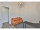 Cozy office space featuring a brown leather sofa, black desk, and stylish lighting, creating an inviting and productive atmosphere at 1410 E Curtis St # 2, Tampa, FL 33603