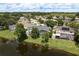 Waterfront property has enclosed pool area and views of the tranquil pond at 16226 Carnoustie Dr, Odessa, FL 33556