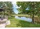 View of the backyard pond from the patio at 16226 Carnoustie Dr, Odessa, FL 33556