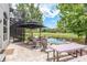 Backyard patio with views of the pond at 16226 Carnoustie Dr, Odessa, FL 33556