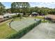 Community basketball court with tennis courts and playground at 16226 Carnoustie Dr, Odessa, FL 33556