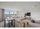 Bright living room featuring modern decor, large windows, and an open concept layout at 16423 Sapphire Point Dr, Lakewood Ranch, FL 34211