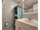 Bathroom featuring a single vanity and an accent shelf with towels at 18650 Gulf Blvd # 314, Indian Shores, FL 33785