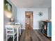 Charming dining area with white table set, coastal decor, and easy access to other rooms at 18650 Gulf Blvd # 314, Indian Shores, FL 33785