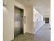 Building elevator, with access to multiple floors, located near an exterior walkway at 18650 Gulf Blvd # 314, Indian Shores, FL 33785
