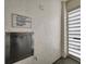 Hallway with trash chute and service information in a condo building at 18650 Gulf Blvd # 314, Indian Shores, FL 33785