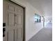 Hallway leading to unit 314, showcasing a secure entrance and common area access at 18650 Gulf Blvd # 314, Indian Shores, FL 33785