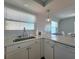 Modern kitchen with quartz countertops, stainless steel appliances, and a cozy sink at 18650 Gulf Blvd # 314, Indian Shores, FL 33785