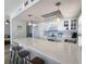 Modern kitchen featuring a breakfast bar, stainless steel appliances, and ample counter space at 18650 Gulf Blvd # 314, Indian Shores, FL 33785