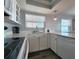 Modern kitchen with stainless steel appliances and ample counter space for cooking at 18650 Gulf Blvd # 314, Indian Shores, FL 33785