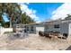 Outdoor patio with dining and lounge seating, perfect for entertaining guests at 2165 Campus Dr, Clearwater, FL 33764
