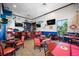 Nautical themed bar with red leather chairs and high top tables at 219 Pompano Se Dr # D, St Petersburg, FL 33705