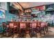A dark and inviting bar with a wide selection of drinks and nautical themed decorations at 219 Pompano Se Dr # D, St Petersburg, FL 33705