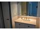 Bathroom includes modern vanity with elegant quartz countertop, storage, and new fixtures at 219 Pompano Se Dr # D, St Petersburg, FL 33705