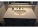Newly renovated bathroom features a modern vanity with a stylish quartz countertop at 219 Pompano Se Dr # D, St Petersburg, FL 33705