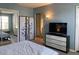 Relaxing bedroom with a room divider and modern dresser at 219 Pompano Se Dr # D, St Petersburg, FL 33705
