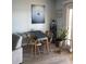 Dining area with a table and a waterfront picture on the wall at 219 Pompano Se Dr # D, St Petersburg, FL 33705