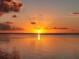 Beautiful water view featuring sunset and calm water at 219 Pompano Se Dr # D, St Petersburg, FL 33705