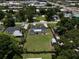 Beautifully maintained fenced property with mature trees and spacious yard at 2306 Cheryl Rd, Largo, FL 33771